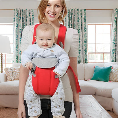 dans le porte bébé maman et bebe sourient