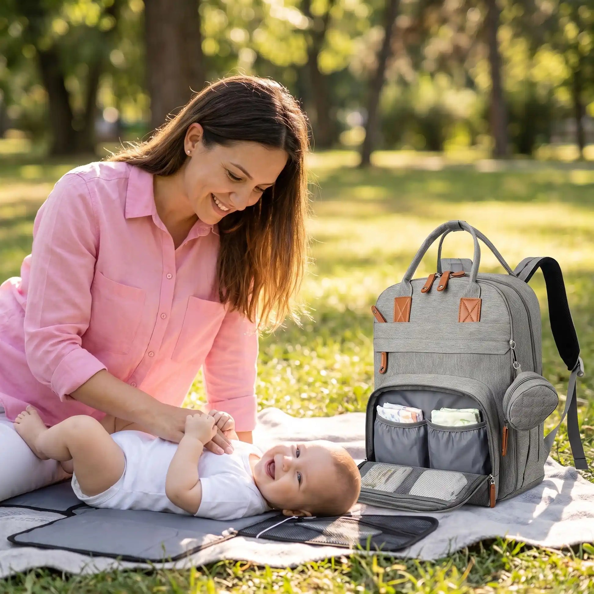 Sac à langer à dos maman au parc
