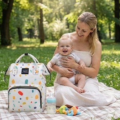 sac à langer bébé maman au jardin