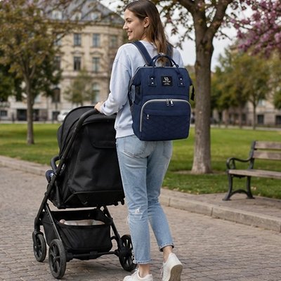 sac à langer maman contente avec son bebe